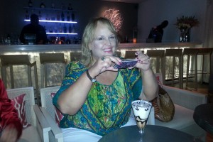Robin taking a picture of her cocktail at Cin Cin Restaurant.  She said that she will definitely be back to Barbados