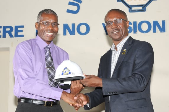 David Jean-Marie, CEO Barbados Port Inc presenting a helmet to one of the awardees David Jean-Marie, CEO Barbados Port Inc presenting a helmet to one of the awardees
